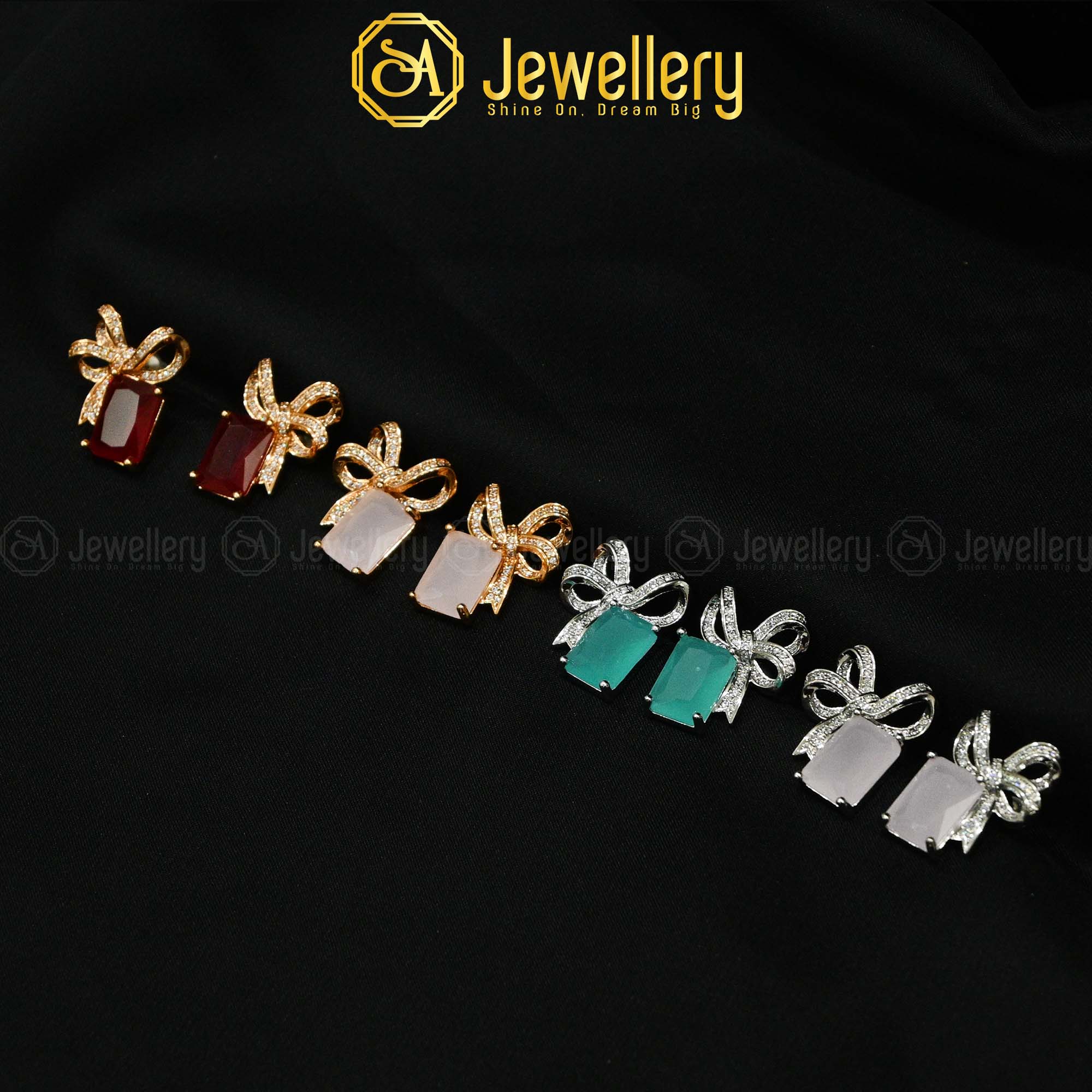 Jerao Zarkan Stone Bow Earrings - Gold & Silver