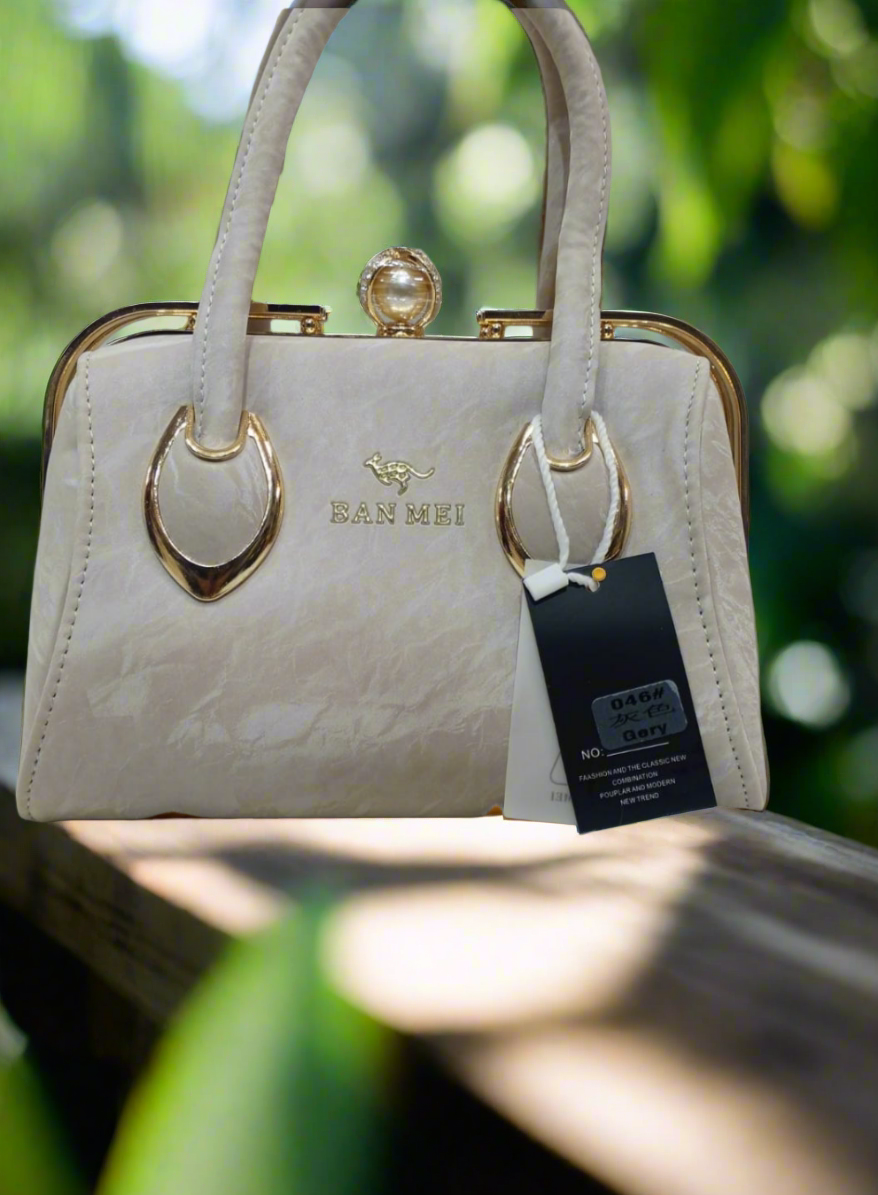 Elegant Textured Shoulder Bag with Leather Handle & Metal Buckle Detailing SA jewellery pk