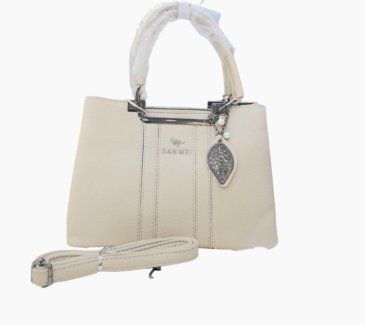 "Luxury Leather Shoulder Handbag for Women - Stylish Crossbody Purse with Circular Relief Ornament"SA jewelry pk